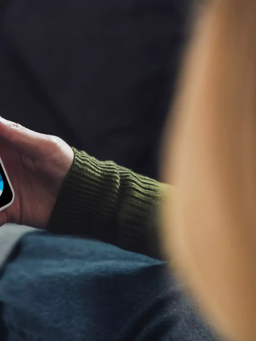 Executive viewing interactive charts on a smartphone