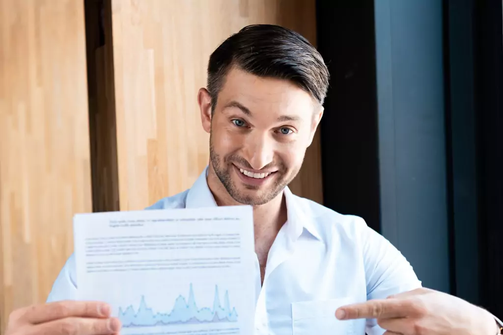 A confident entrepreneur looking forward with focus, illustrating the kind of results-driven leader who uses a Business Momentum System built for real-world momentum.